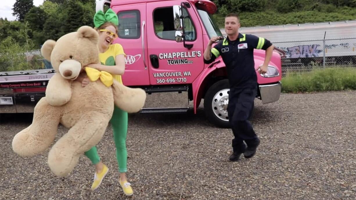 Breck Johnson, left, and tow truck driver Dan Carroll put on an impromptu dance for young viewers of the "Brecky Breck" YouTube TV show. The show, which is aimed at toddlers (and their parents), simply means to demonstrate how our community works and how much fun it is to get connected.