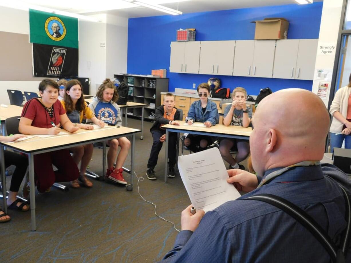 Ridgefield: The View Ridge Middle School Knowledge Bowl teams get ready to buzz in during a practice session last season.