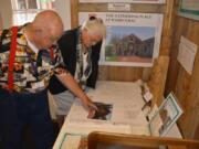 Washougal: Camas Washougal Historical Society President Jim Cobb describes the Gathering Place project to Kay Dalke-Sheadel, executive director of the Honorable Frank L. and Arlene J. Price Foundation, which recently donated $5,000 toward the project.