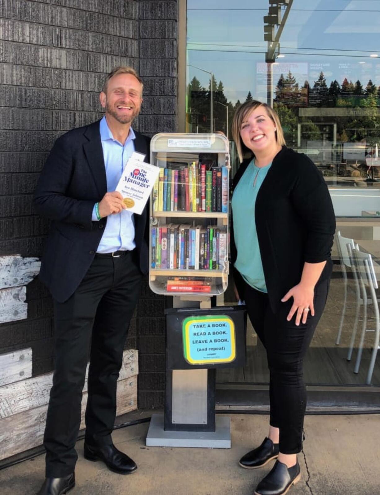 Fourth Plain Village: Trevor Haynes, CEO of Subway, and Traci Martin, vice president of operations for the local franchisee, at the new Free Little Community Library at a Vancouver Subway location on Fourth Plain Boulevard.