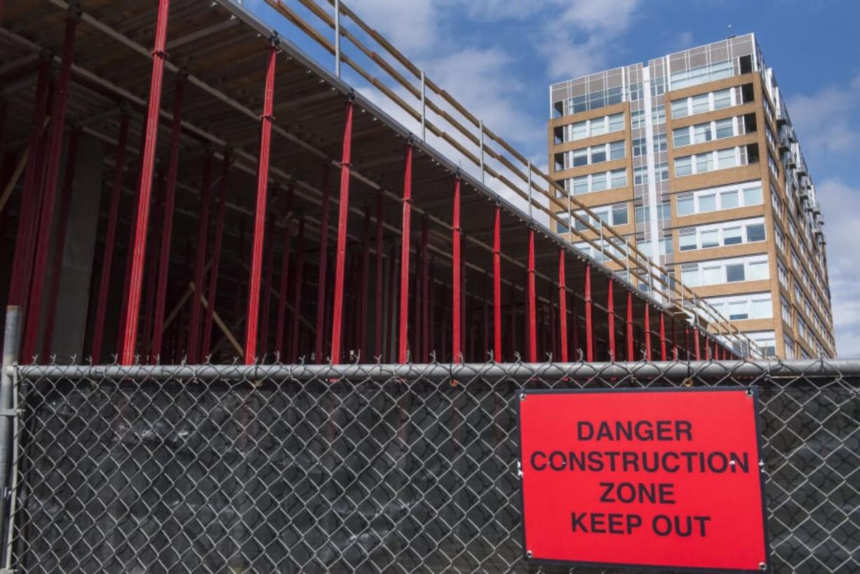 The construction site for the Vancouver Center south tower on Friday afternoon. One of the other three Vancouvercenter towers is visible in the background.