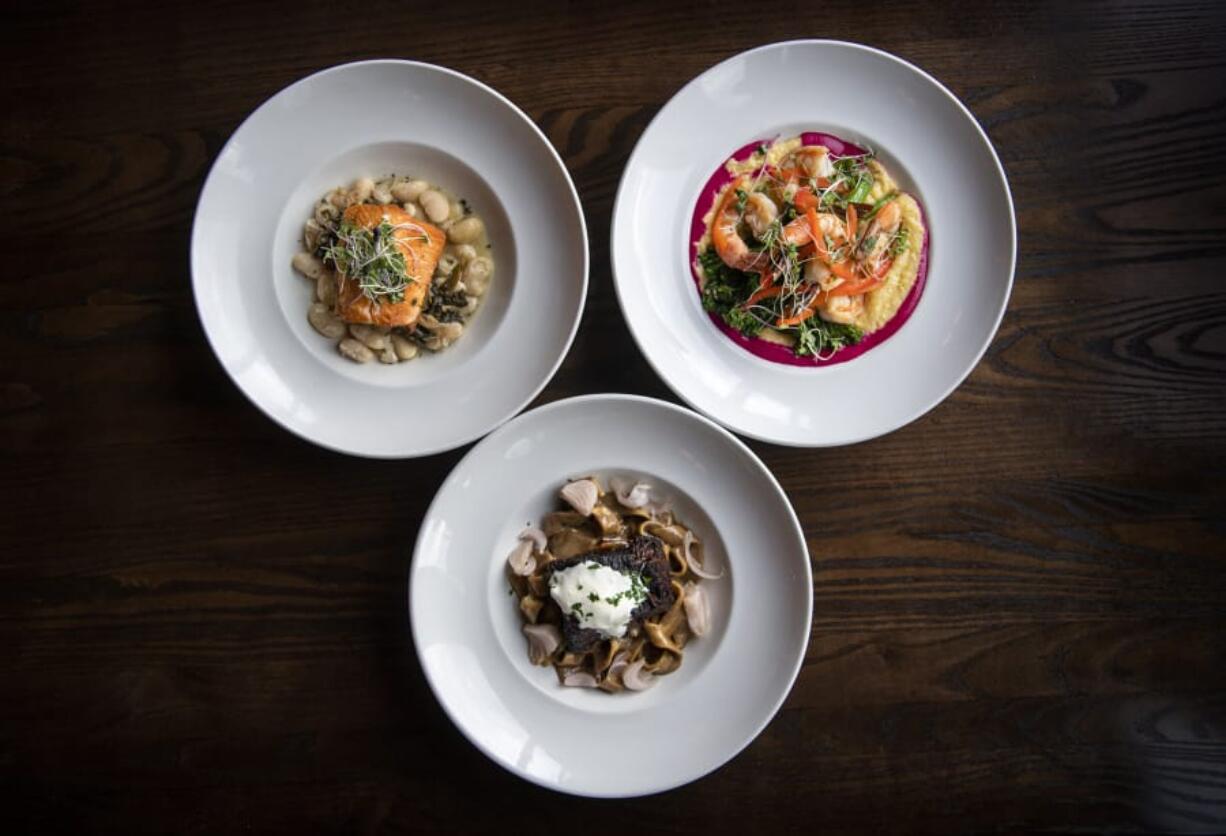 The Columbia River steelhead, clockwise from left, the Pacific prawns and the braised shortrib stroganoff at Skamania Lodge&#039;s Cascade Dining Room in Stevenson.