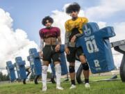 Prairie?s Zeke Dixson, left, and AJ Dixson, pose for a press photo at Prairie High School on Wednesday afternoon, Sept. 18, 2019.