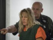 Stephanie "Sam" Westby makes a first appearance Sept. 17 in Clark County Superior Court on suspicion of first-degree domestic violence murder in the slaying of her husband, 51-year-old Joseph Westby. Sam Westby, who posted bail and appeared out of custody Friday, entered a not-guilty plea to the charge.