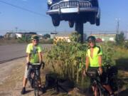 Brothers Mike, left, and Mark Roskam pose for a photo in Kansas during their cross-country cycling journey to raise funds for Open House Ministries. The trip was cut short after Mike Roskam was struck by a pickup in Oklahoma.