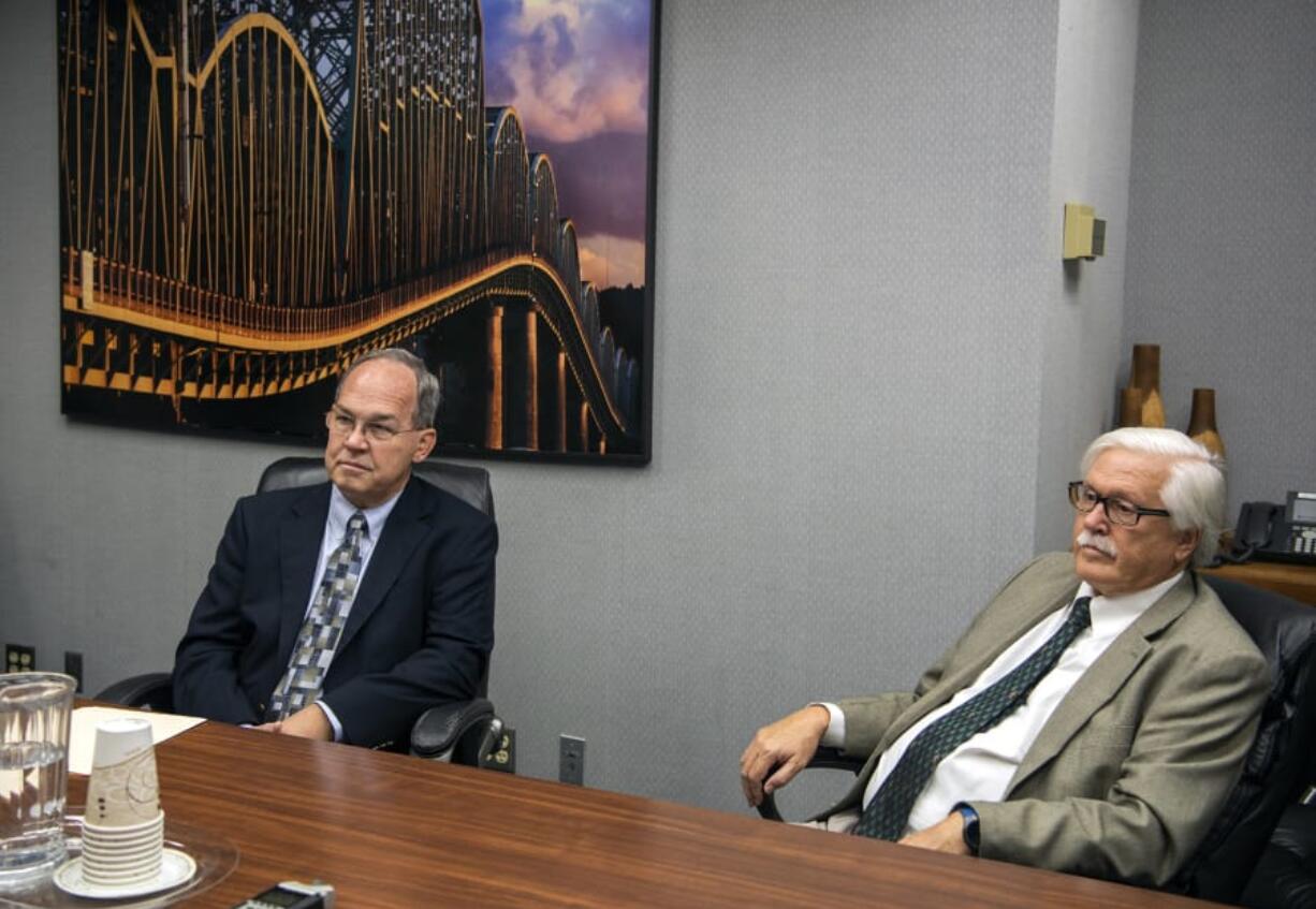 Jack Burkman, left, and Dan Barnes, the two candidates for an open seat on the Port of Vancouver Board of Commissioners, meet with The Columbian&#039;s Editorial Board Thursday.