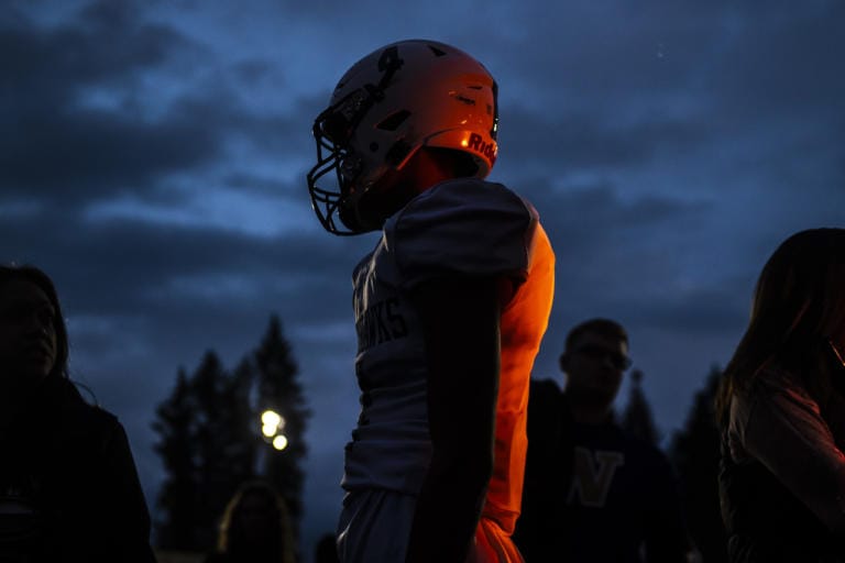 Chiawana’s Aiden Mason waits to load the bus home after the Riverhawks fell to the Union Titans 21-20 at McKenzie Stadium on Friday night, Sept 27, 2019.