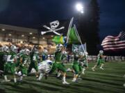 Mountain View runs onto the field before their game against Union at McKenzie Stadium on Friday night, Sept 27, 2019.