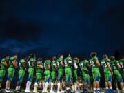 Mountain View lines up for the national anthem before their game against Heritage at McKenzie Stadium on Friday night, Sept 27, 2019.