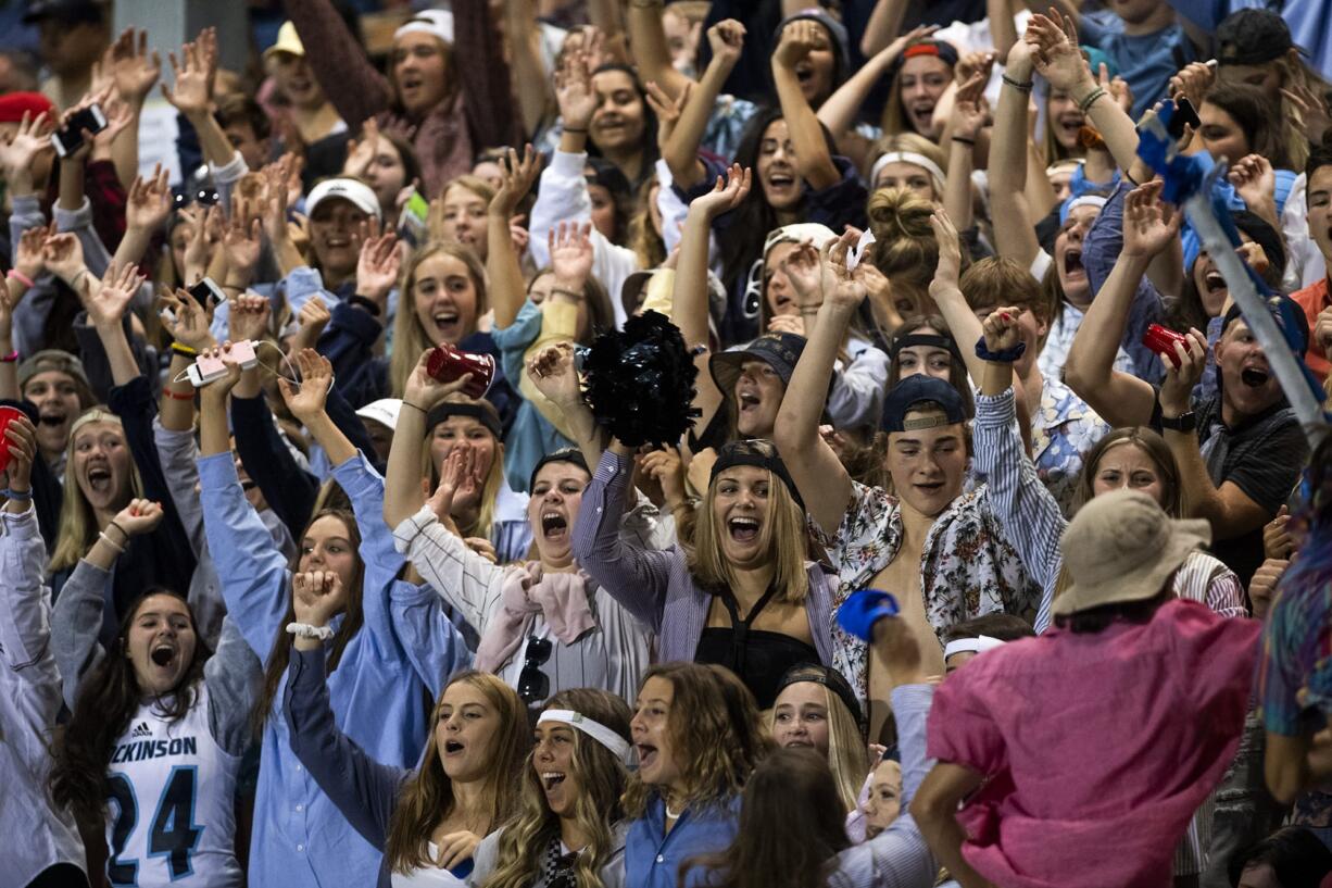 Hockinson fans cheer on their team during Friday nightÕs game in Hockinson on Sept. 13, 2019. The HawkÕs lost 21-27.