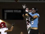 HockinsonÕs Peyton Brammer (9) catches a pass from Levi Crum to score the HawkÕs third touchdown of the night during Friday nightÕs game in Hockinson on Sept. 13, 2019. The HawkÕs lost 21-27.