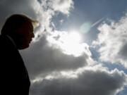 FILE - In this Oct. 27, 2018 file photo, President Donald Trump speaks to reporters in Indianapolis. An AP-NORC Center poll released on Thursday, Sept. 12, 2019, finds Americans are most unhappy with Trump on his handling of climate change.