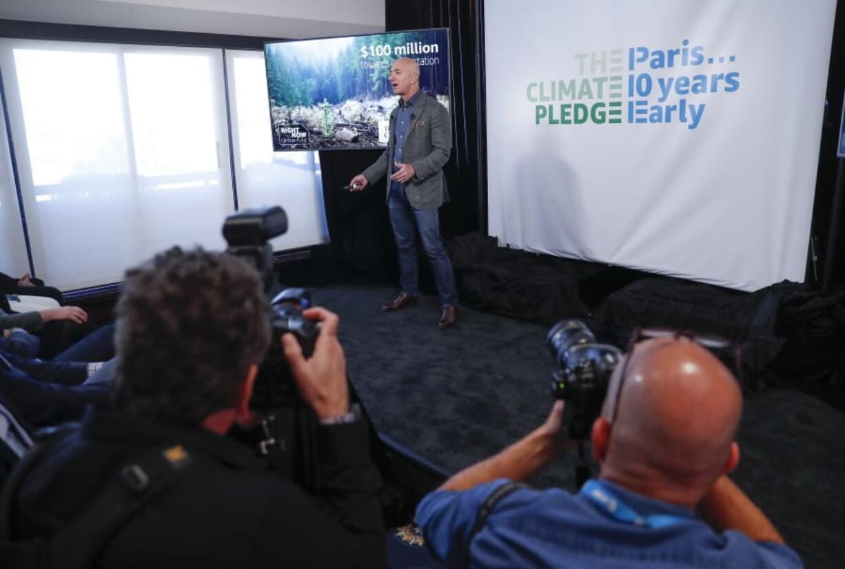 Amazon CEO Jeff Bezos speaks at news conference at the National Press Club in Washington, Thursday, Sept. 19, 2019. Bezos announced the Climate Pledge, setting a goal to meet the Paris Agreement 10 years early.