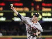 Houston Astros starting pitcher Zack Greinke throws to a Seattle Mariners batter during the fifth inning of a baseball game Wednesday, Sept. 25, 2019, in Seattle.