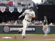 Seattle Mariners&#039; Kyle Seager rounds the bases on his two-run home run against the Oakland Athletics in the first inning of a baseball game Sunday, Sept. 29, 2019, in Seattle.