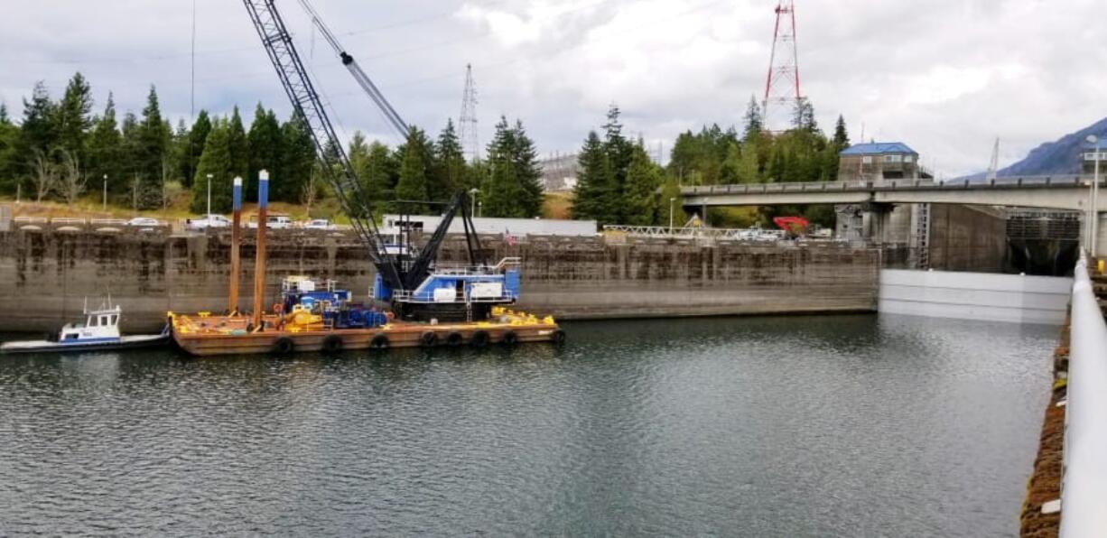 A U.S. Army Corps of Engineers photo shows the Bonneville Lock on Sunday with temporary barriers in place to allow it to be drained. With the lock closed, barges that shuttle millions of tons of wheat, wood and other inland goods to the Pacific Ocean for transport to Asia can’t move. It’s not clear when repairs will be complete. Megan Innes/U.S.