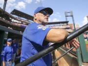 Chicago Cubs manager Joe Maddon looks out from the dugout prior to a baseball game against the St. Louis Cardinals, Sunday, Sept. 29, 2019, in St. Louis.