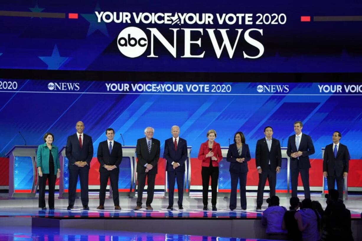 From left, Democratic presidential candidates Sen. Amy Klobuchar, D-Minn., Sen. Cory Booker, D-N.J., South Bend Mayor Pete Buttigieg, Sen. Bernie Sanders, I-Vt., former Vice President Joe Biden, Sen. Elizabeth Warren, D-Mass., Sen. Kamala Harris, D-Calif., entrepreneur Andrew Yang, former Texas Rep. Beto O’Rourke and former Housing Secretary Julian Castro are introduced Thursday, before a Democratic presidential primary debate in Houston. david j.