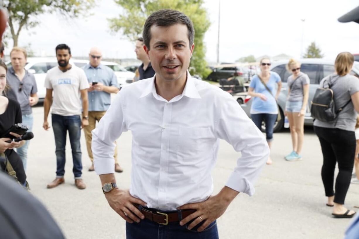 FILE - In this Sept. 2, 2019, file photo, Democratic presidential candidate Pete Buttigieg talks with attendees at the Hawkeye Area Labor Council Labor Day Picnic in Cedar Rapids, Iowa. Buttigieg would like to turn the fight for the 2020 Democratic presidential nomination into a contest about generational change. But there&#039;s one looming problem for the 37-year-old mayor of South Bend, Indiana: He has yet to win over his own.