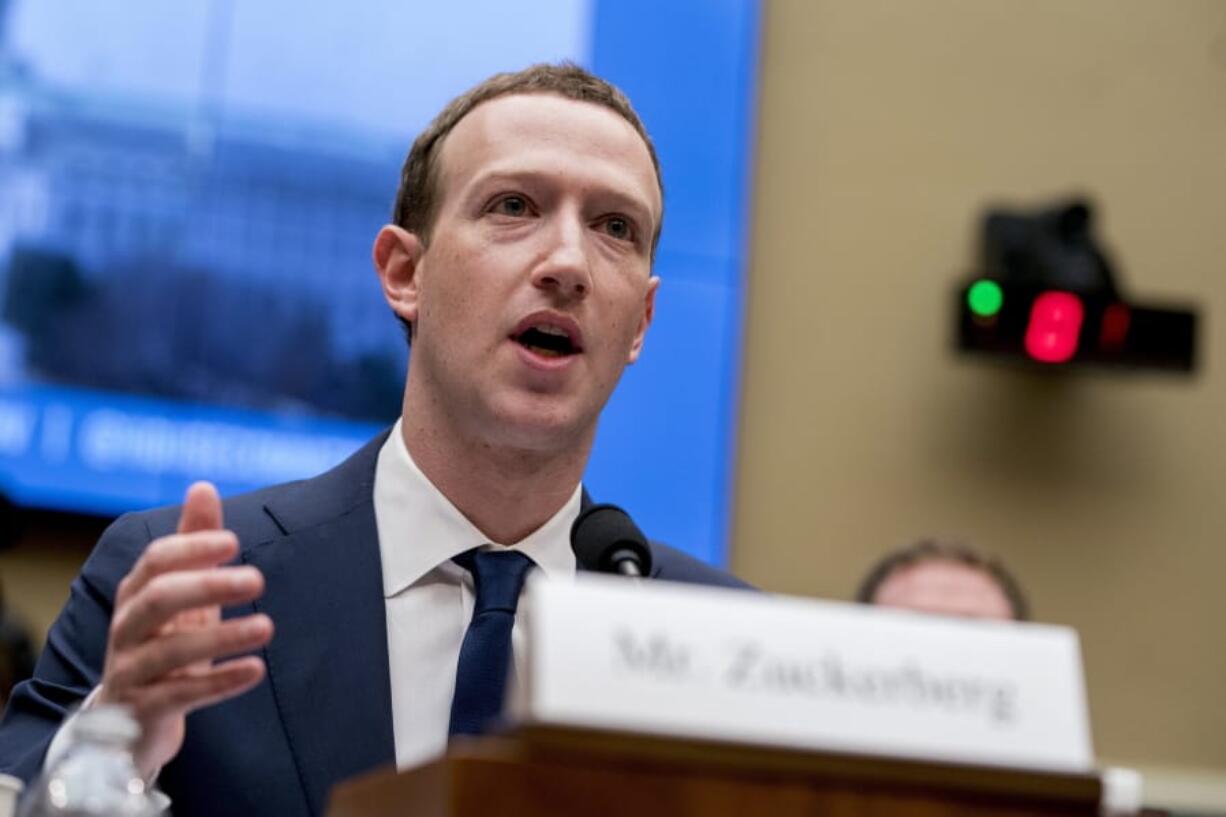 FILE - In this April 11, 2018, file photo, Facebook CEO Mark Zuckerberg testifies before a House Energy and Commerce hearing on Capitol Hill in Washington about the use of Facebook data to target American voters in the 2016 election and data privacy. Zuckerberg will be in Washington Thursday, Sept. 19, 2019, to meet with lawmakers and talk about internet regulation. The company said the meetings are not public and it did not give details on whom Zuckerberg is meeting with and what, exactly, he&#039;ll discuss.