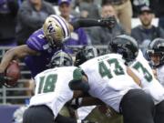 Washington quarterback Jacob Eason passes against Hawaii during the first half of an NCAA college football game, Saturday, Sept. 14, 2019, in Seattle. (AP Photo/Ted S.