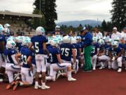 Mountain View football coach Adam Mathieson talks to his team after its 47-0 win over Juanita on Friday at McKenzie Stadium.