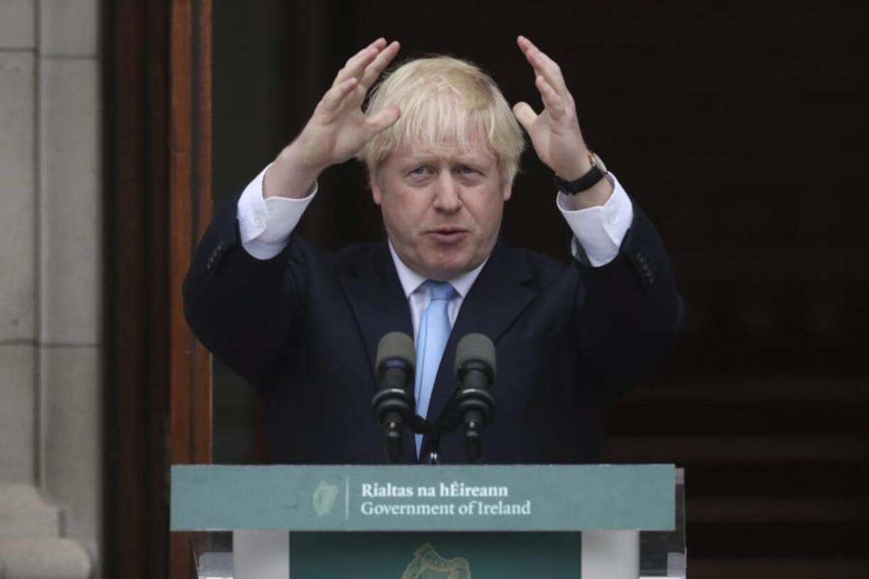 Britain’s Prime Minister Boris Johnson gestures during a meeting with Ireland’s Prime Minister Leo Varadkar at Government Buildings in Dublin, Monday Sept. 9, 2019. Boris Johnson is to meet with Leo Varadkar in search of a compromise on the simmering Brexit crisis.