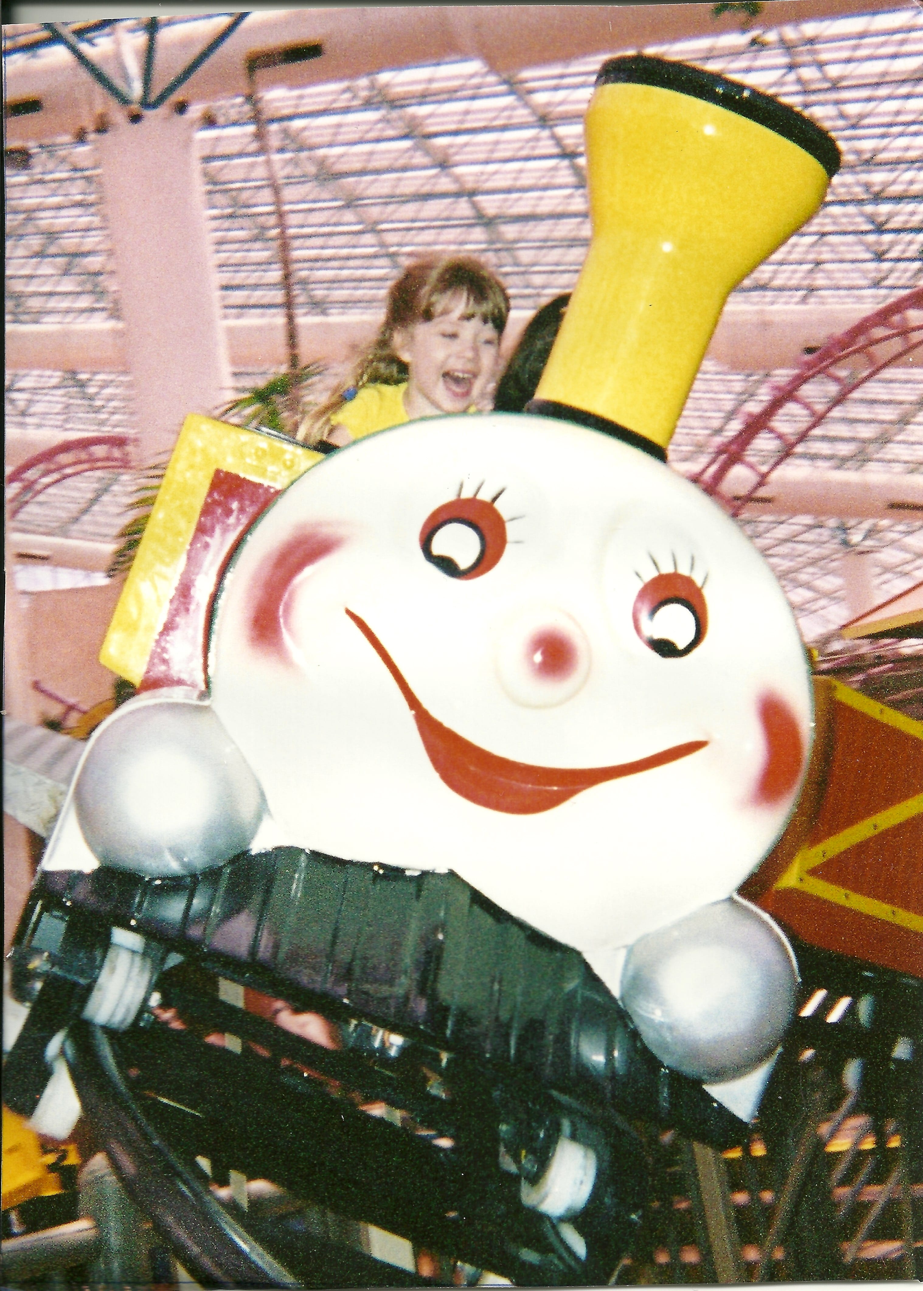 Pure Joy on the face of my granddaughter Sophie riding the roller coaster at Circus Circus in Las Vegas; in 2002 when she was 4 years old. Picture taken by Victoria Moy (grandmother).