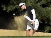 Hannah Green of Australia hits out of a bunker on the fifth hole during the final round of the LPGA Cambia Portland Classic golf tournament in Portland, Ore., Sunday, Sept. 1, 2019.