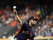 Houston Astros starting pitcher Gerrit Cole throws against the Seattle Mariners during the first inning of a baseball game Sunday, Sept. 8, 2019, in Houston. (AP Photo/David J.