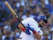 Chicago Cubs’ Kyle Schwarber hits a three-run triple against the Seattle Mariners during the seventh inning of a baseball game Monday, Sept. 2, 2019, in Chicago.