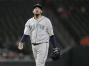 Seattle Mariners starting pitcher Felix Hernandez looks on between batters during the first inning of a baseball game against the Baltimore Orioles, Friday, Sept. 20, 2019, in Baltimore.