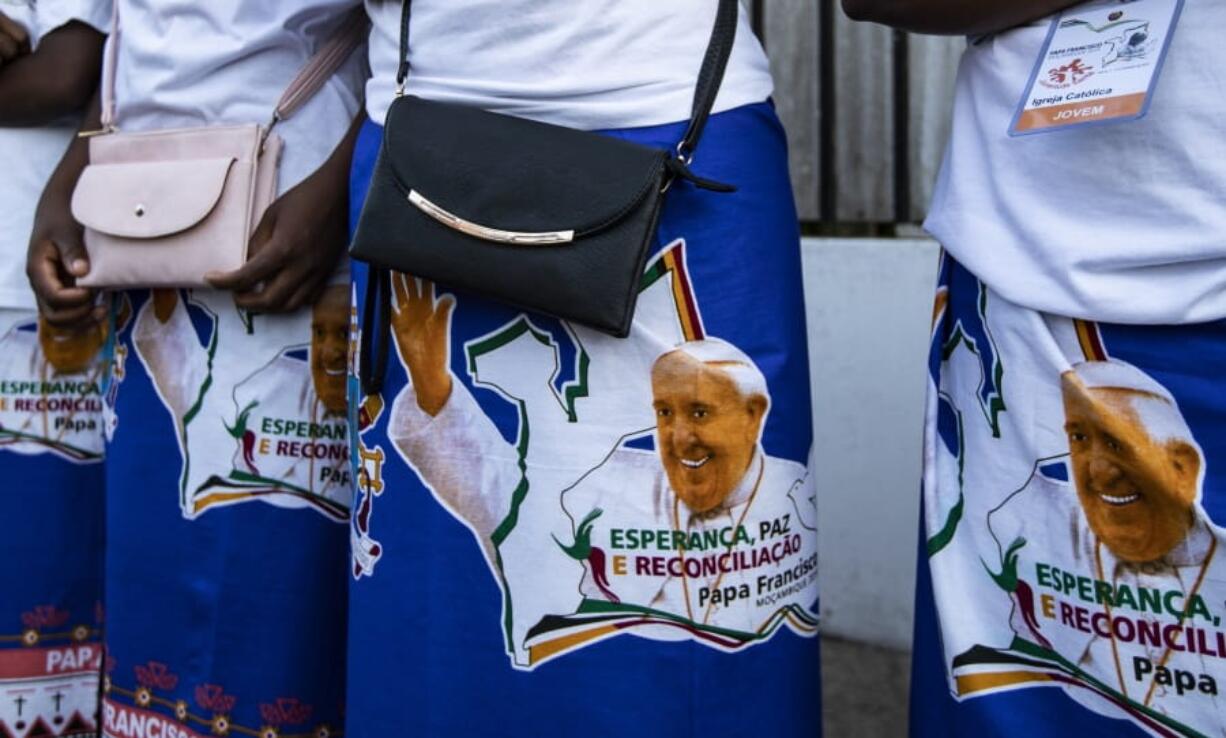 Catholic women wait to see Pope Francis, ahead of his expected arrival near to the Apostolic Nunciature in the capital Maputo, Mozambique Wednesday, Sept. 4, 2019. Pope Francis is opening a three-nation pilgrimage to southern Africa with a strategic visit to Mozambique, just weeks after the country’s ruling party and armed opposition signed a new peace deal and weeks before national elections.