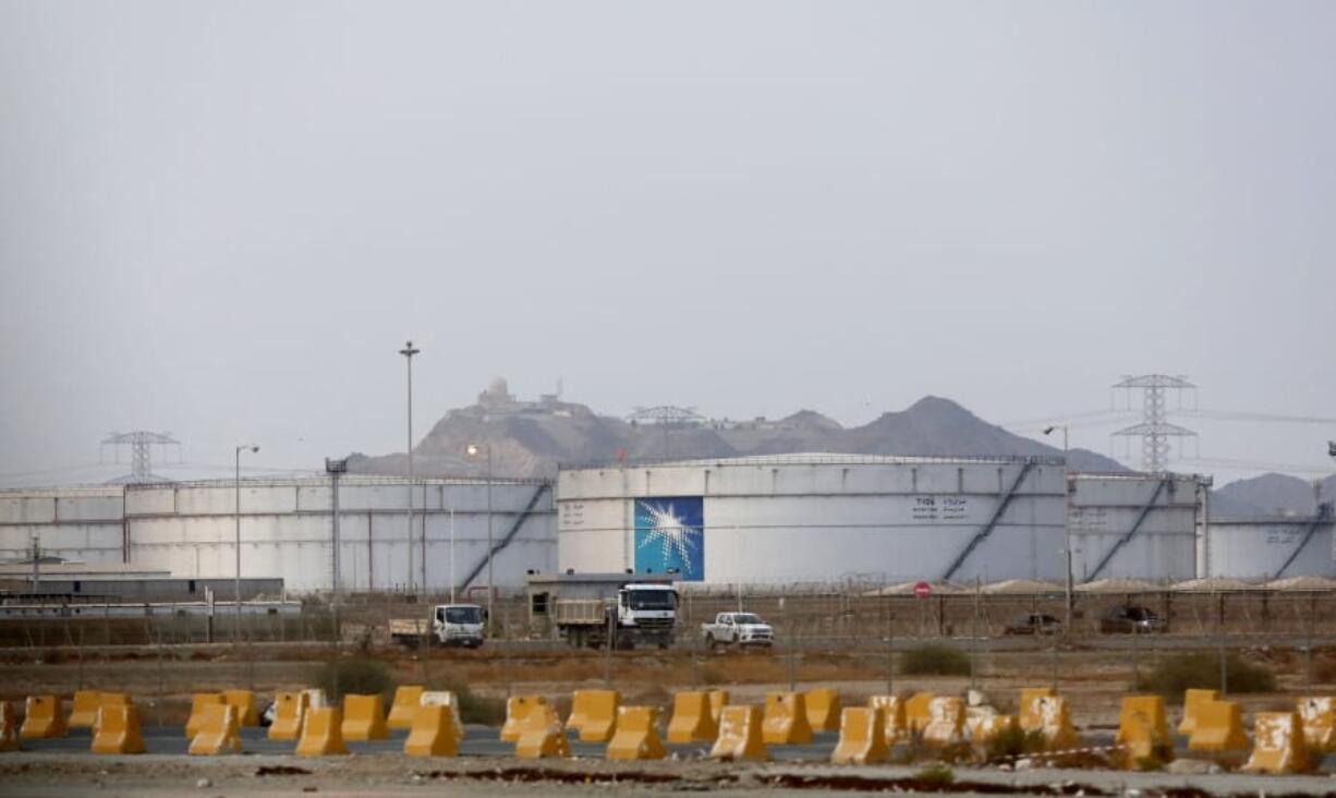 Storage tanks are seen at the North Jiddah bulk plant, an Aramco oil facility, in Jiddah, Saudi Arabia, Sunday, Sept. 15, 2019. The weekend drone attack in Buqyaq on one of the world&#039;s largest crude oil processing plants that dramatically cut into global oil supplies is the most visible sign yet of how Aramco&#039;s stability and security is directly linked to that of its owner -- the Saudi government and its ruling family.