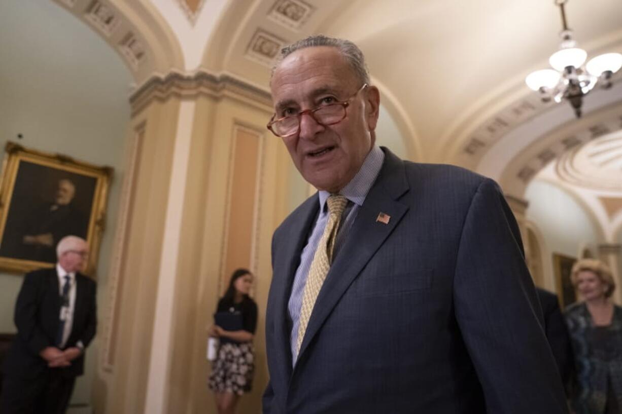 Senate Minority Leader Chuck Schumer, D-N.Y., arrives to speak to reporters at a news conference at the Capitol in Washington, Tuesday, Sept. 17, 2019. (AP Photo/J.