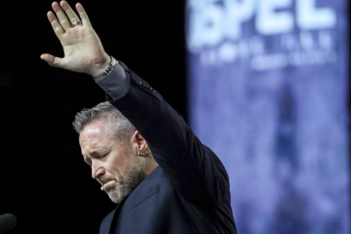 FILE - In this Wednesday, June 12, 2019 file photo, J. D. Greear, president of the Southern Baptist Convention, talks about sexual abuse within the SBC on the second day of the SBC&#039;s annual meeting in Birmingham, Ala. Greear blamed the crisis on years of cover-ups, but praised a new anti-abuse curriculum being offered to all of its churches and seminaries, and he said they must do better in screening potential pastors.