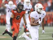 CORRECTS TO SATURDAY NOT FRIDAY  - Stanford wide receiver Michael Wilson, foreground, scores a touchdown off a pass from quarterback Davis Mills during the first half of an NCAA college football game against Oregon State in Corvallis, Ore., Saturday, Sept. 28, 2019.