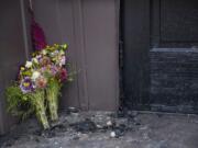 Flowers are left on the charred steps of the Adas Israel Synagogue Sunday September 15, 2019 in Duluth, Minn. A press conference was held  on Sunday morning to discuss the findings of the investigation of the Adas Israel Synagogue fire that occurred early last week. A suspected was arrested last week and will be charged with first degree arson but there is no indication at this time that it was a hate crime.