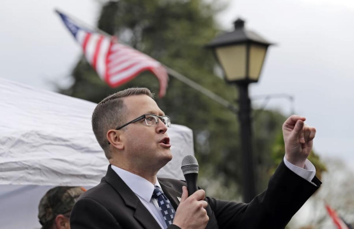 State Rep. Matt Shea, R-Spokane Valley, speaks at a gun-rights rally at the Capitol in Olympia on Jan. 18.