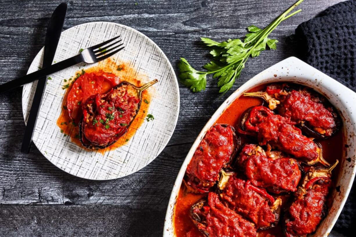 Eggplant Stuffed With Onions, Peppers, Cheese and Nuts.