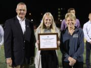 Jorie Freitag, center, was presented with the Granish Scholar Award by University of Rochester. Freitag captains in women&#039;s soccer team and is pursuing a degree in medicine.