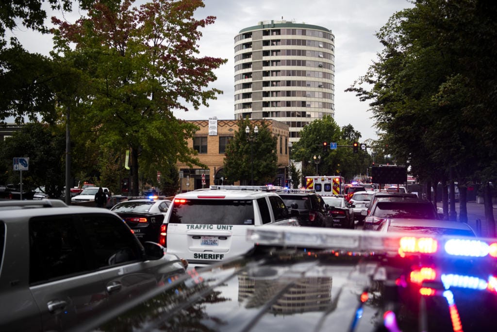 Local law enforcement vehicles line up along Washington St. in downtown Vancouver as they work an active shooter situation at Smith Tower on Thursday afternoon, Oct. 3, 2019.