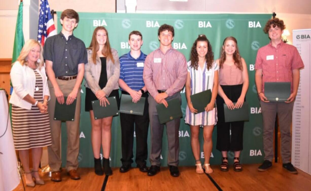 SHUMWAY: Pictured from left are Lisa Thompson, of the Building Industry Association; James Carmona, La Center High School graduate; Ellie Josephson, attending Portland State University; Michael Cline, Camas High School graduate; Kyle Brabec, Hockinson High School graduate; Marissa Hunter, Cedar Tree Classical Christian School graduate; Alicia Wallingford, Columbia River High School graduate; and Eli Loudenback, Cedar Tree Classical Christian School graduate.