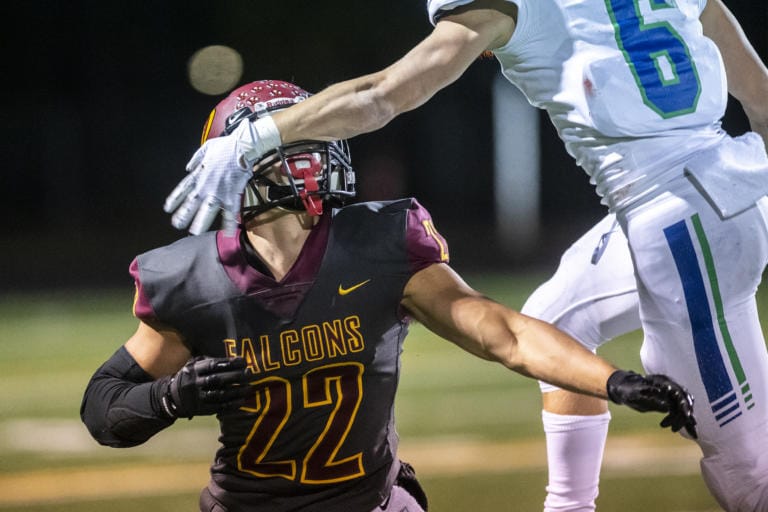 Prairie’s Dustin Shelby has his vision blocked by Mountain View’s Davis Delmage in a play that would be called for pass interference with seconds left in the 4th quarter, keeping Prairie’s hope alive for one more play at Battle Ground District Stadium Thursday night, Oct. 10, 2019.