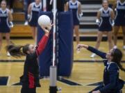 Camas&#039; Alliyah Barnes blocks a hit from Skyview&#039;s Allyson Reid during the 4A Greater St. Helens League match Tuesday at Skyview. Camas won 3-0.