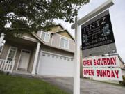 A sign notifies those passing by of a home for sale in Salmon Creek on Tuesday. The latest RMLS report for Clark County shows the housing market slowing down as it enters the winter season, but sales remain higher than at this time last year.