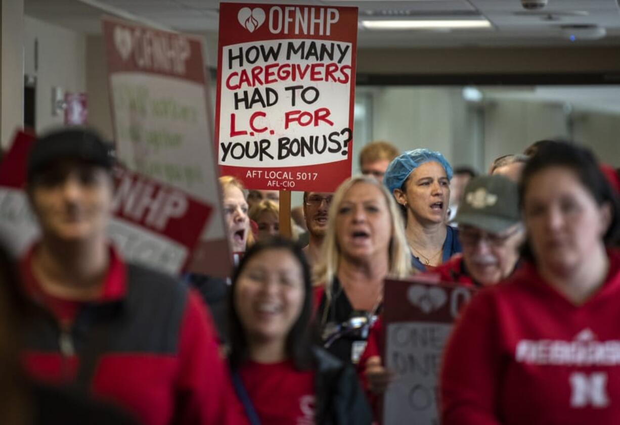 More than 50 members of the Oregon Federation of Nurses and Health Professionals hold a rally and march through PeaceHealth Southwest Medical Center to support the union&#039;s bargaining team on Wednesday. L.C. stands for &quot;low census,&quot; which refers to staff members having short-notice shift cancellations. This situation can lead to staff members having to take PTO to fill the gaps in their hours for the week.