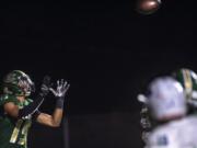 Evergreen's Tae Marks catches the game winning pass during a game against Mountain View at McKenzie Stadium on Friday night, Oct. 18, 2019.