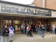 BRUSH PRAIRIE: The Crimson Crew greeted Prairie High School students with candy and high fives to start the school day.