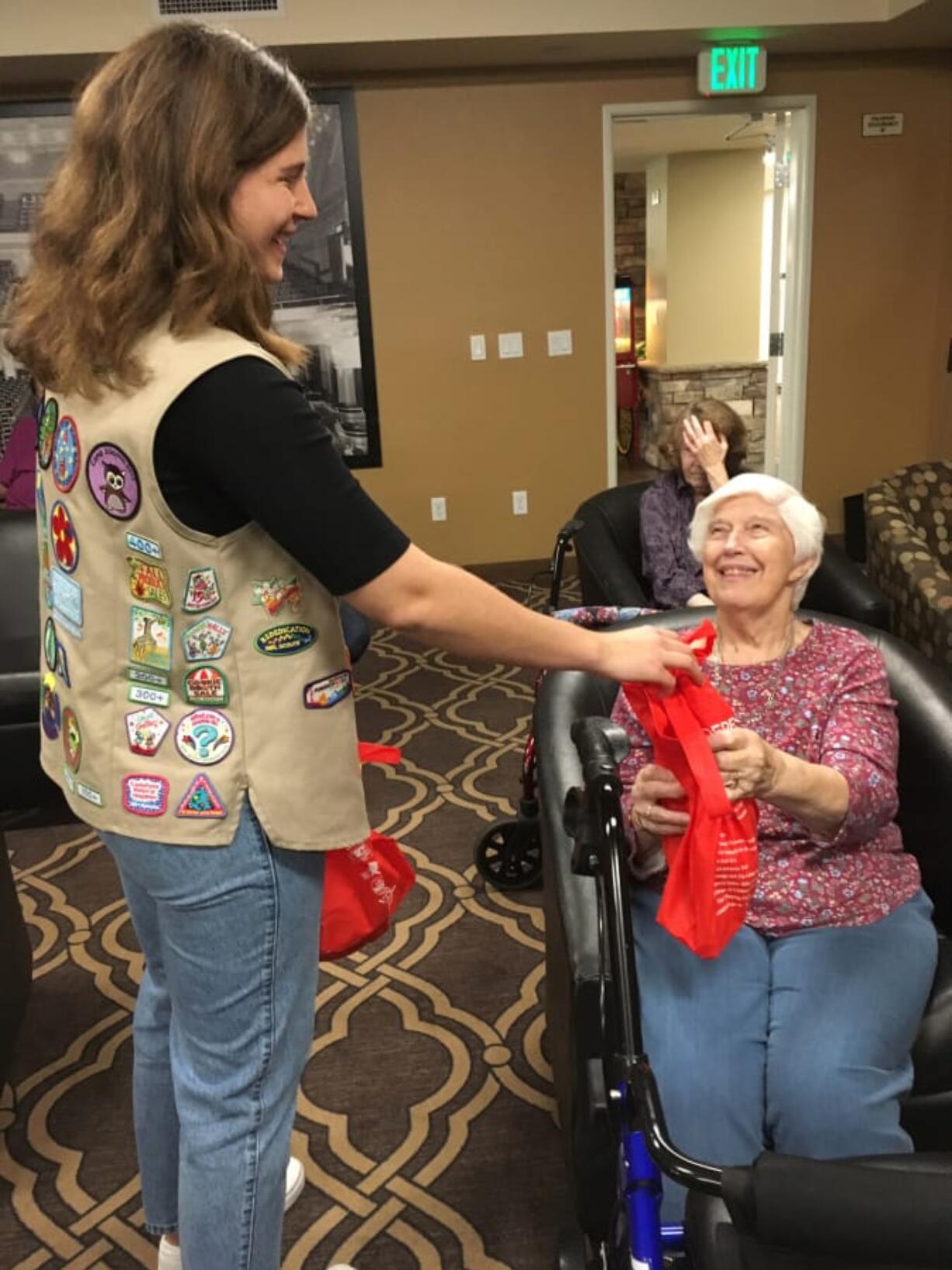 Pleasant Valley: Gabby Karber, a senior at Vancouver&#039;s iTech Preparatory High School, hands out emergency kits to seniors as part of her Girl Scout Gold Award project.